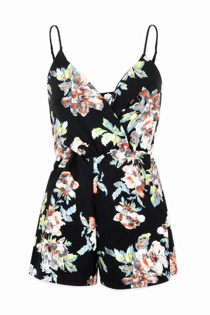 Front view of Boohoo women’s black floral polyester romper one-piece, size UK 10, 3-inch leg pullover