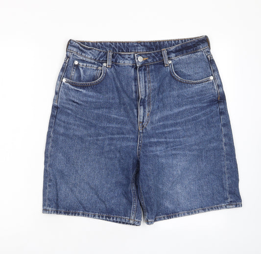 Front view of Weekday women’s blue cotton boyfriend shorts, size UK 31, in, 8-inch leg regular zip - pockets, logo