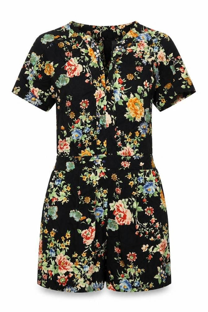 Front view of Warehouse women’s black floral viscose romper one-piece, size UK 6, 3-inch leg button