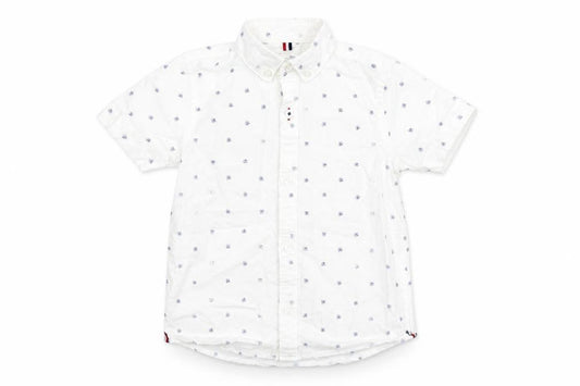 Front view of Next boys’ white geometric cotton basic button-up, size 4, years collared button - skull pattern