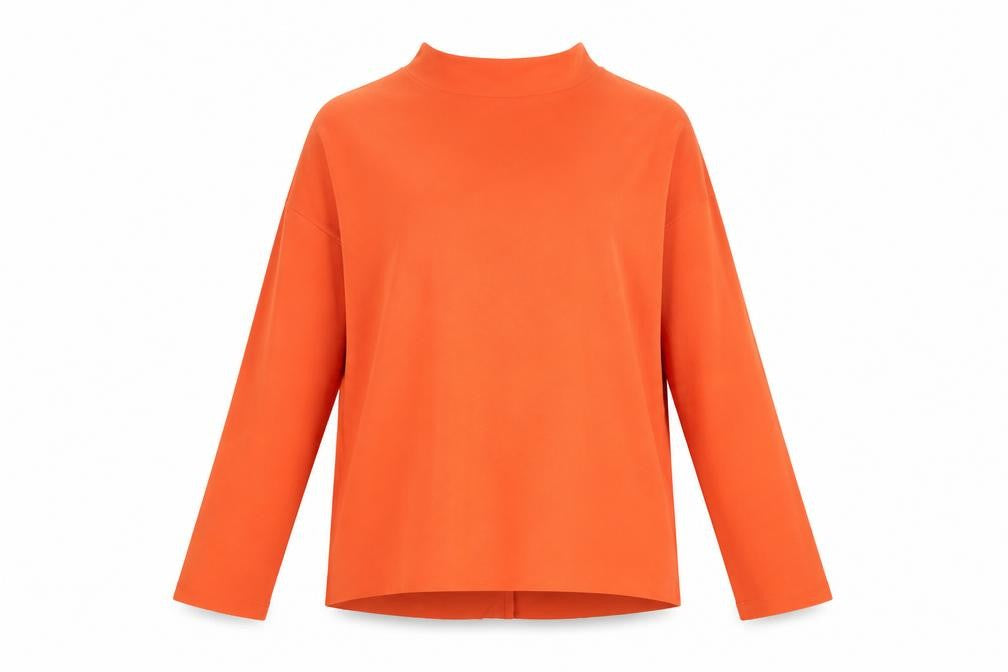 Front view of Weekday women’s orange viscose basic blouse, size S, mock neck