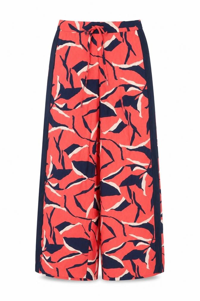Front view of Marks & Spencer women’s red geometric polyester trousers, size UK 10, 28-inch leg regular drawstring
