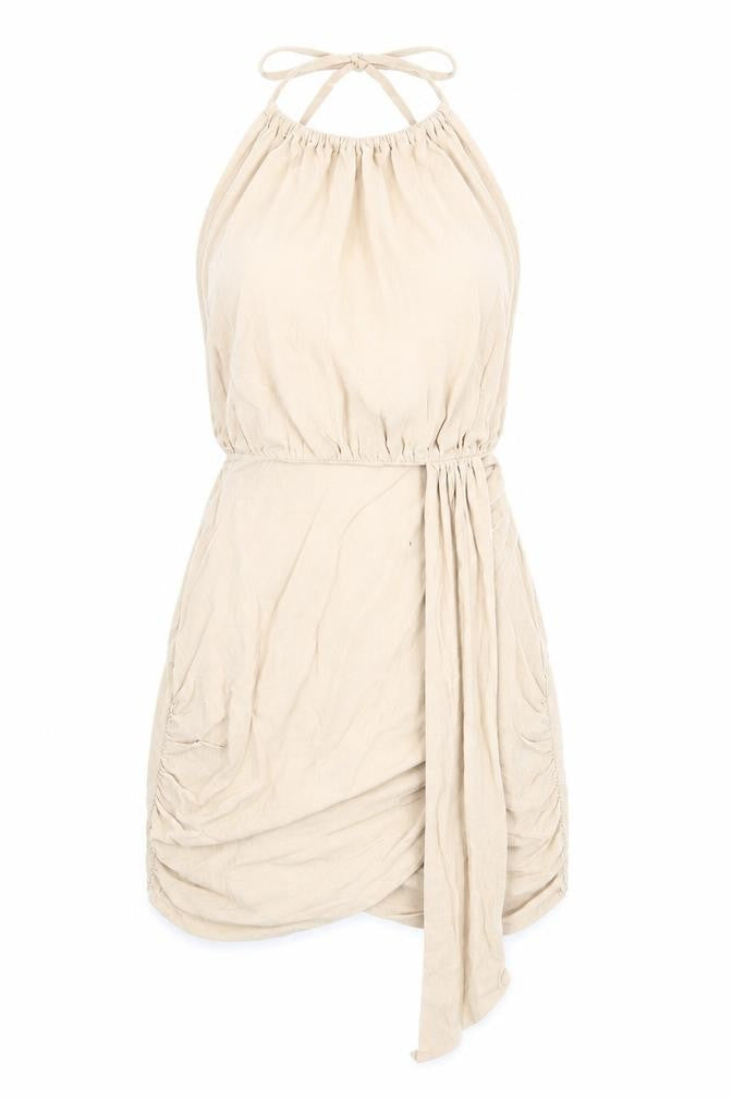 Front view of PRETTYLITTLETHING women’s beige cotton mini, size UK 6, halter zip