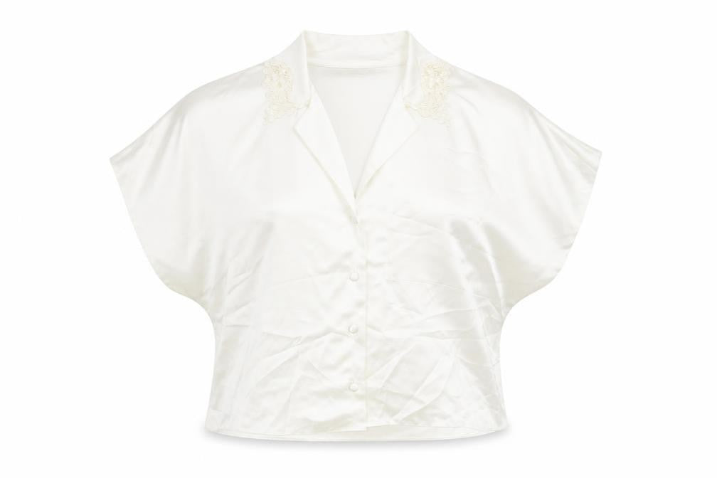 Front view of Marks & Spencer women’s ivory polyester cropped button-up, size UK 12, collared