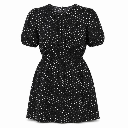 Front view of Marks & Spencer women’s black polka dot polyester a-line, size UK 10, round neck button