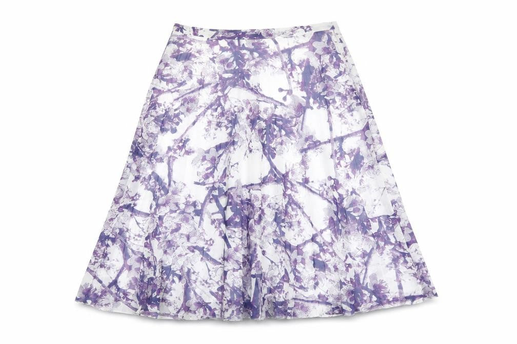 Front view of Marks & Spencer women’s white floral polyester swing skirt, size UK 10, zip