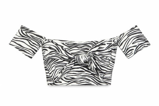 Front view of PRETTYLITTLETHING women’s white animal print polyester cropped t-shirt, off the shoulder - twist front