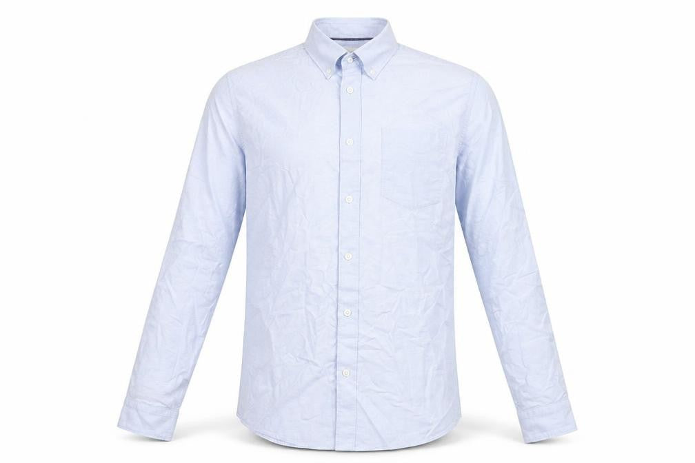 Front view of Marks & Spencer men’s blue cotton button-up, size M, collared button