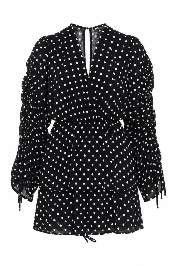 Front view of PRETTYLITTLETHING women’s black polka dot polyester mini, size UK 10, v-neck tie