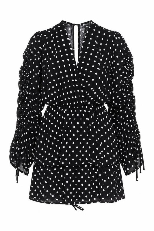 Front view of PRETTYLITTLETHING women’s black polka dot polyester mini, size UK 10, v-neck tie