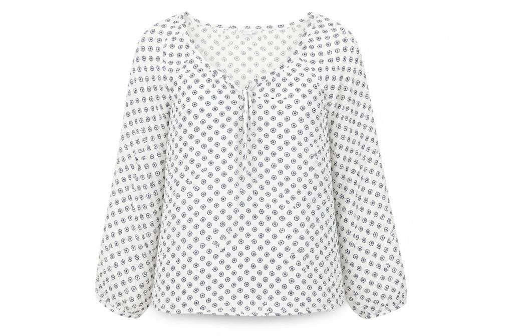 Front view of Amisu women’s white floral polyester basic blouse, size L, v-neck
