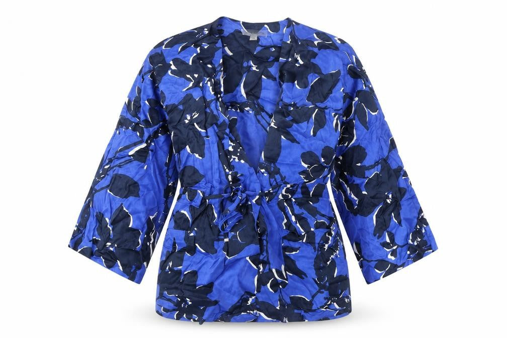 Front view of Autograph women’s blue geometric viscose wrap blouse, size M, v-neck