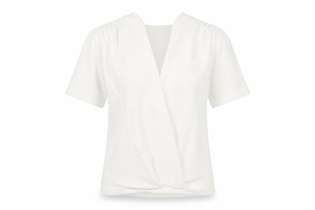 Front view of Zara women’s white polyester basic blouse, size S, v-neck