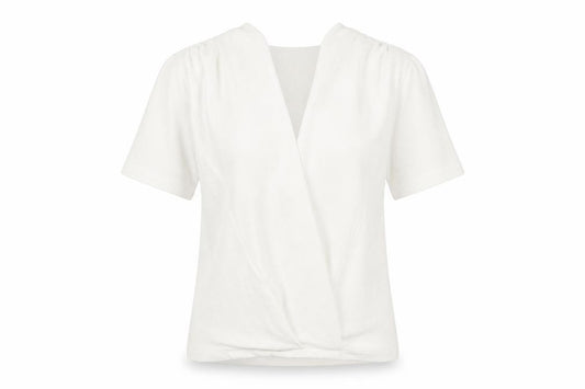 Front view of Zara women’s white polyester basic blouse, size S, v-neck