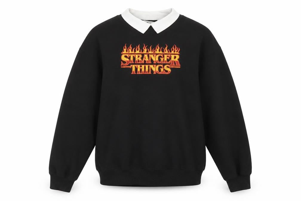Front view of H&M girls’ black cotton pullover sweatshirt, size 10-11, years pullover