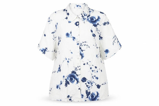 Front view of Essence women’s white floral viscose basic button-up, size UK 16, collared