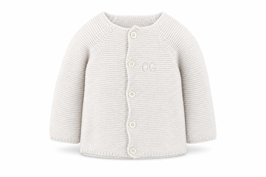 Front view of Toffee Moon girls’ white cotton cardigan jumper, size 6-9, months button - 6-12 months