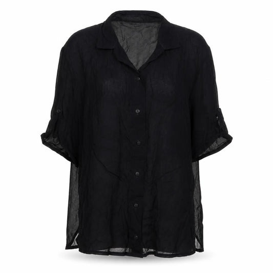 Front view of Doris Streich. women’s black polyester basic button-up, size UK 8, collared