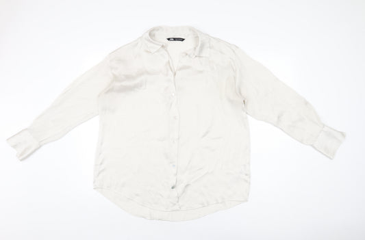 Front view of Zara women’s ivory polyester basic button-up, size L, collared