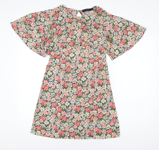 Front view of In Vogue women’s blue floral polyester shift, size S, round neck zip