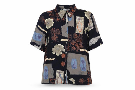 Front view of Canda women’s blue floral viscose basic button-up, size UK 16, collared