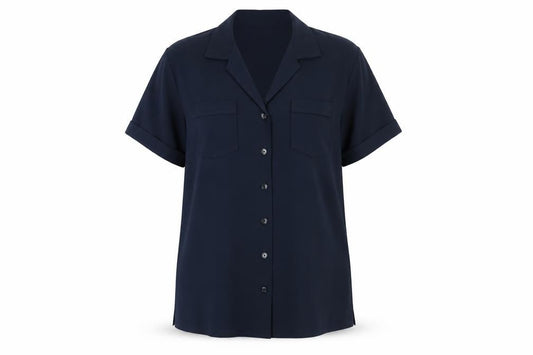 Front view of Janique women’s blue polyester basic button-up, size L, collared - pockets