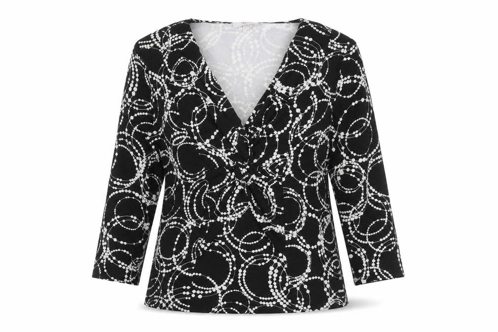 Front view of Country Casuals women’s black geometric viscose basic t-shirt, size M, v-neck