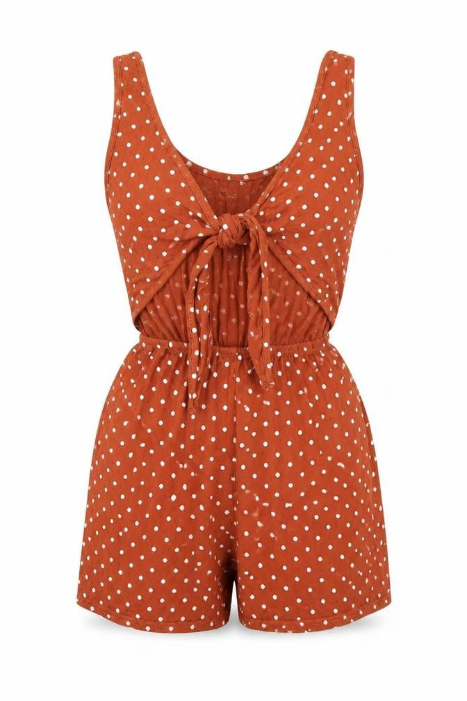 Front view of PRETTYLITTLETHING women’s brown polka dot viscose playsuit one-piece, size UK 6, pullover