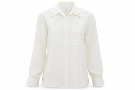 Front view of Country Casuals women’s ivory polyester basic button-up, size S, collared