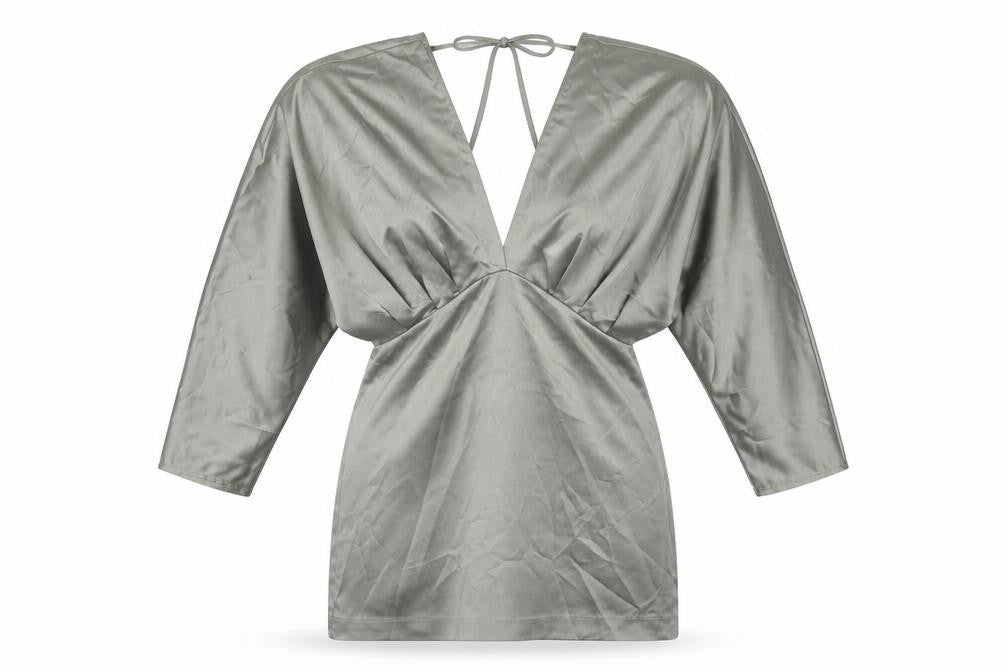 Front view of Zara women’s green polyester mini, size M, v-neck zip