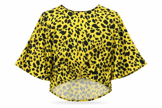 Front view of Quiz women’s yellow animal print polyester basic blouse, size UK 10, round neck