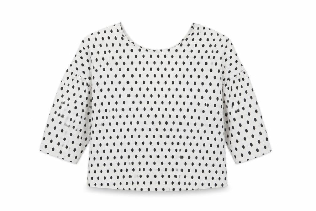 Front view of Miss Selfridge women’s white polka dot polyester basic t-shirt, size UK 10, crew neck