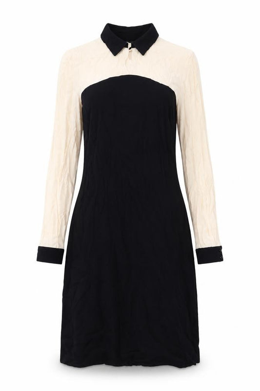 Front view of Marks & Spencer women’s beige viscose a-line, size UK 12, round neck button