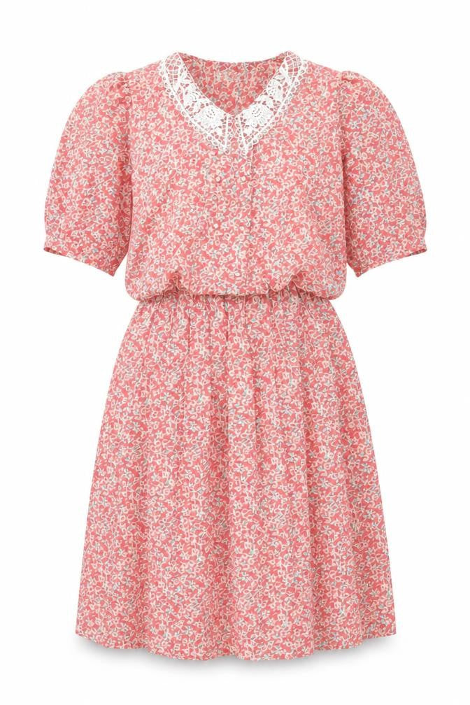 Front view of Debenhams women’s pink floral polyester a-line, size UK 12, collared button