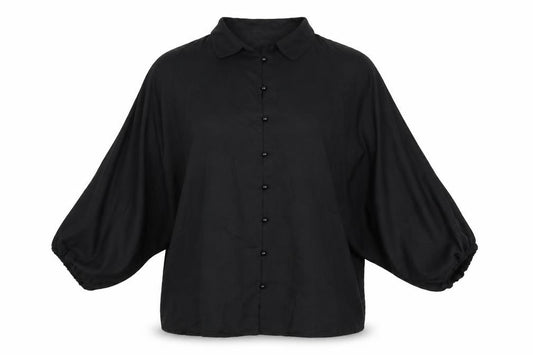 Front view of PRETTYLITTLETHING women’s black polyester basic button-up, size UK 12, collared