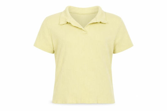 Front view of Zara girls’ yellow polyester basic polo, size 9, years collared pullover