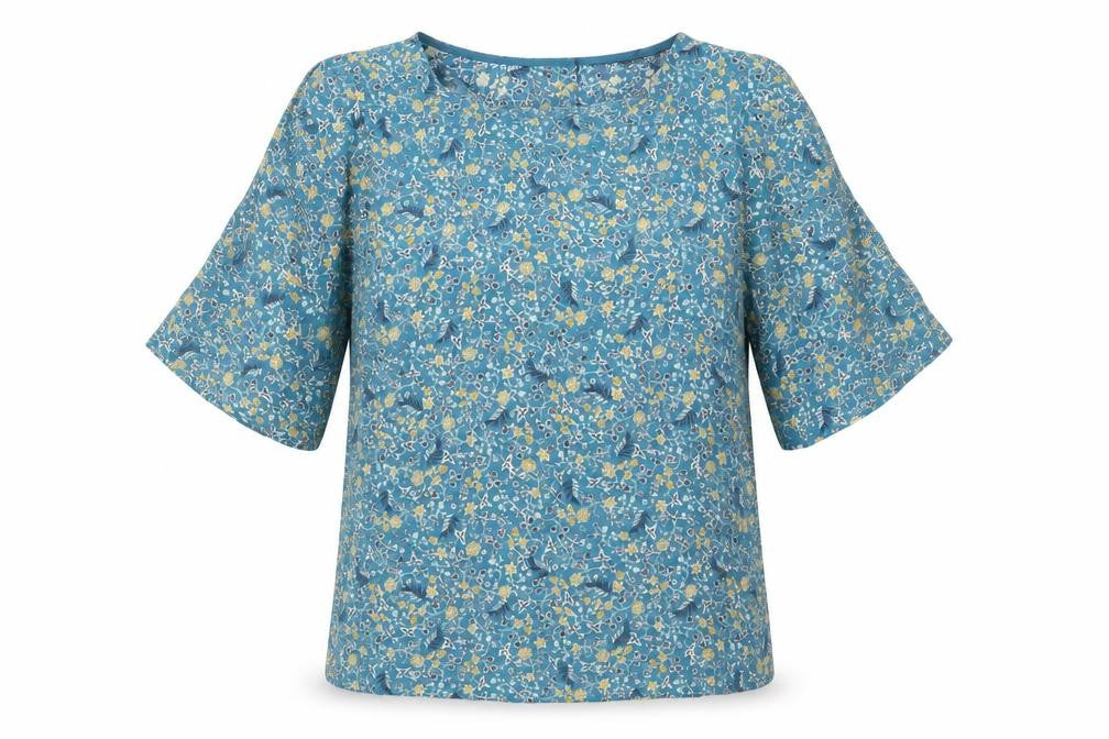 Front view of Marks & Spencer women’s blue geometric modal basic blouse, size UK 6, round neck - floral print