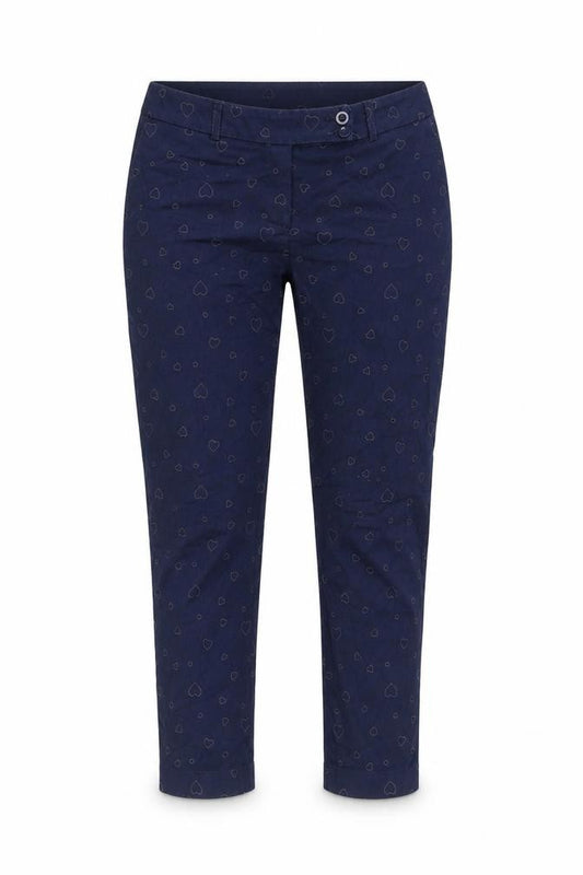 Front view of Next women’s blue geometric cotton trousers, size UK 30, in, 24-inch leg regular zip - heart pattern