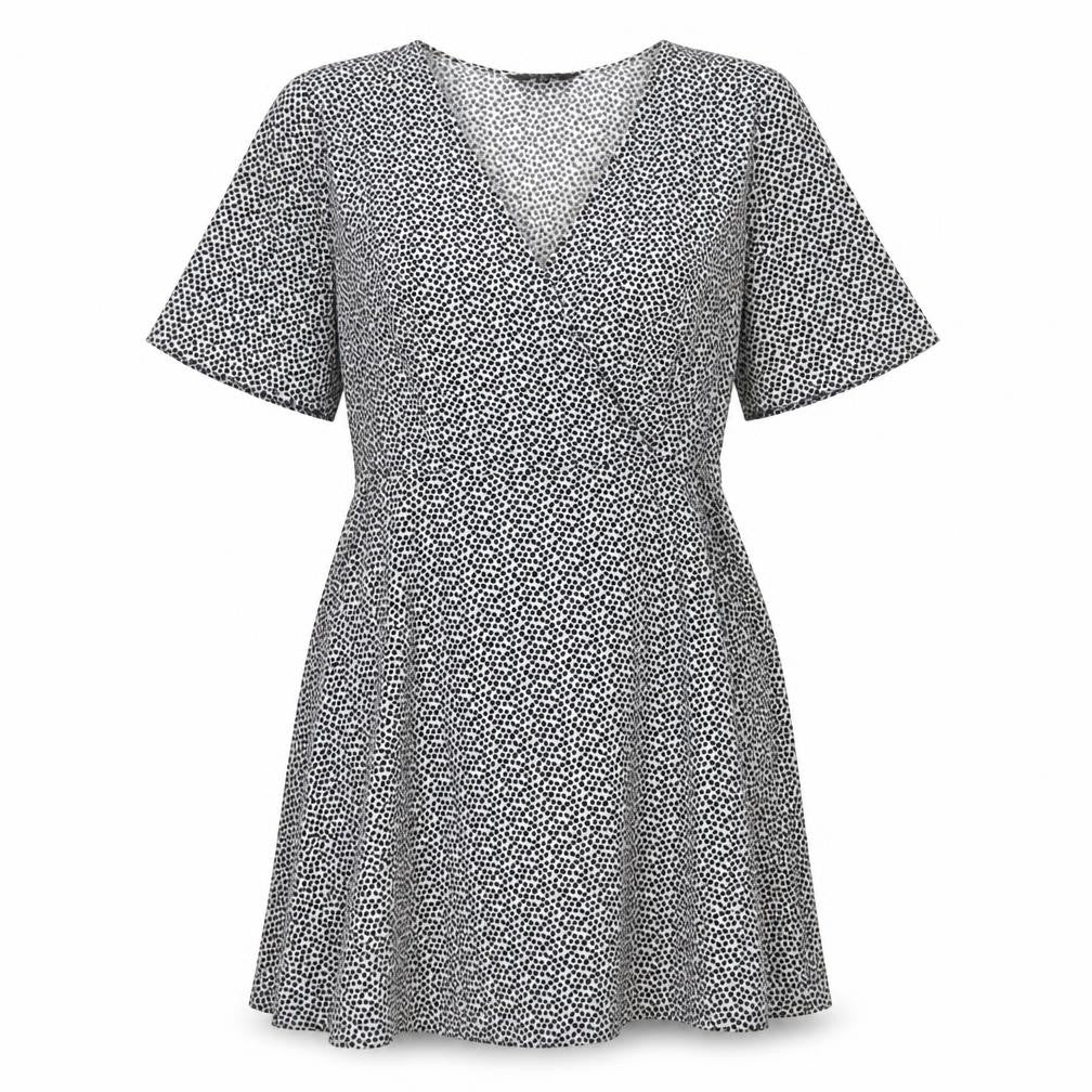 Front view of New Look women’s white polka dot polyester a-line, size UK 12, v-neck zip