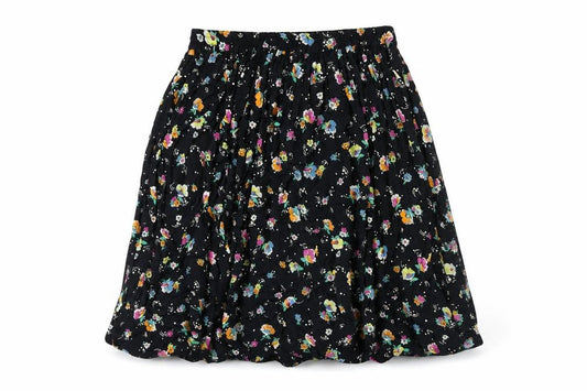 Front view of Wagner Moden women’s blue geometric polyester peasant skirt, size UK 10, - floral print