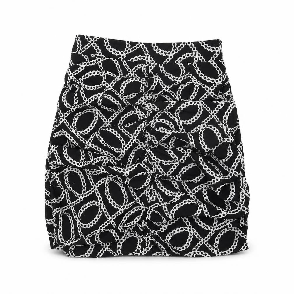 Front view of Misspap women’s black geometric polyester mini skirt, size UK 8, zip