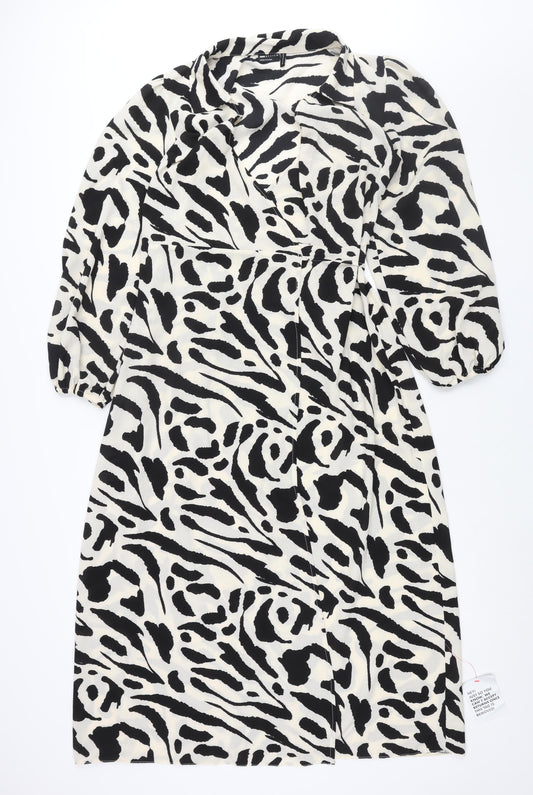 Front view of ASOS women’s ivory geometric polyester wrap dress, size UK 12, collared tie
