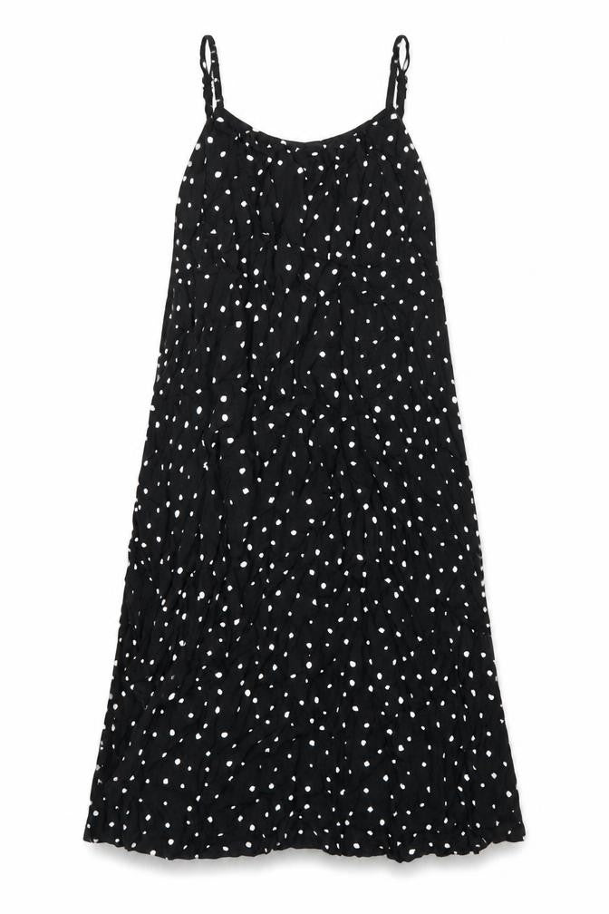 Front view of Marks & Spencer women’s black polka dot viscose a-line, size UK 8, round neck pullover