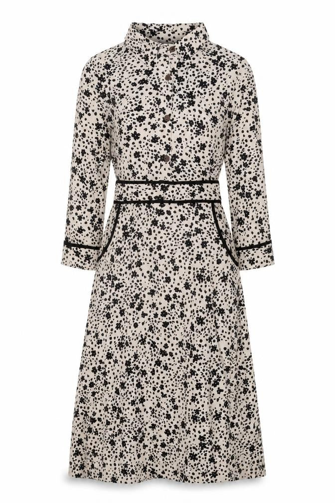 Front view of Monteau women’s white floral polyester a-line, size M, collared button