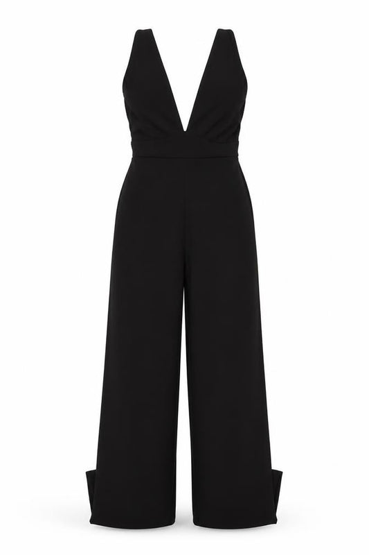 Front view of PRETTYLITTLETHING women’s black polyester jumpsuit one-piece, size UK 4, 35-inch leg pullover