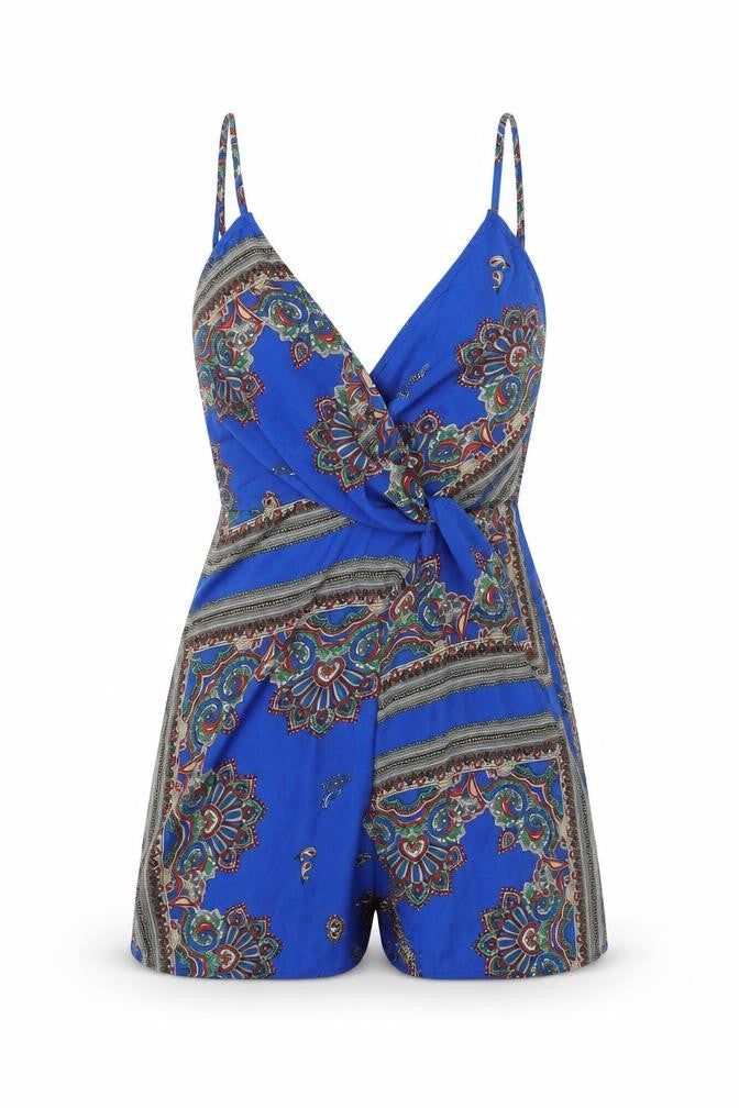 Front view of Missguided women’s blue geometric polyester mini, size UK 8, v-neck zip