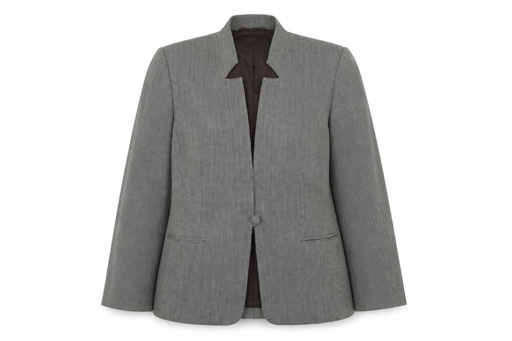 Front view of Country Casuals women’s black polka dot wool jacket blazer, size UK 14