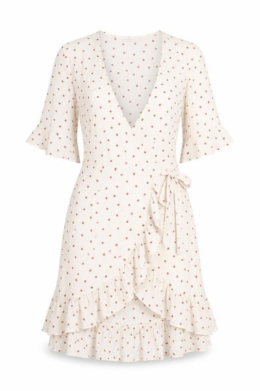 Front view of Vera & Lucy women’s white geometric polyester wrap dress, size M, v-neck pullover - hearts