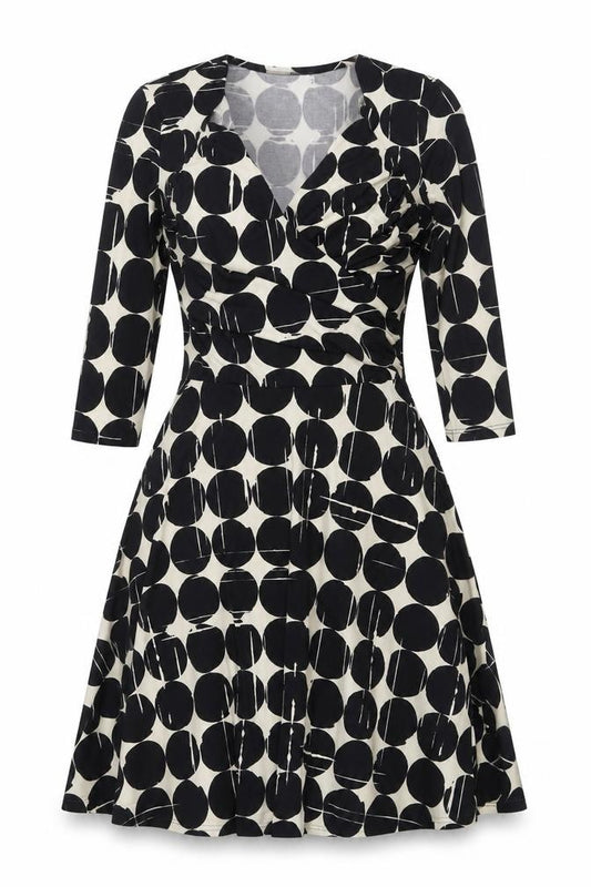 Front view of Leota women’s black polka dot polyester fit & flare, size S, v-neck pullover