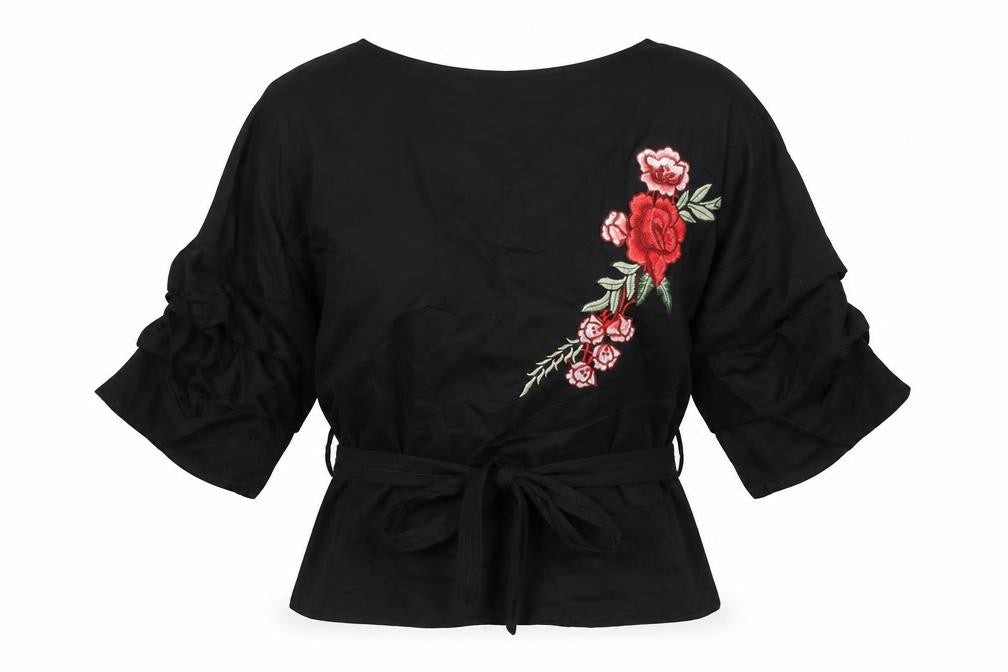 Front view of PRETTYLITTLETHING women’s black cotton basic button-up, size M, boat neck - floral embellished